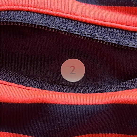 Lululemon Pace Setter Skirt. Bright orange and inkwell sea stripe. Size 2 - Picture 7 of 10